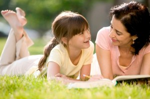 Mother Helping Daughter with Her Homework